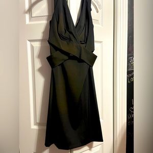 Black, taffeta cocktail dress from Black and White store. Size 10.  Never worn
